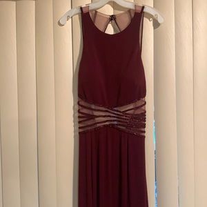 Beautiful dress never worn burgundy color